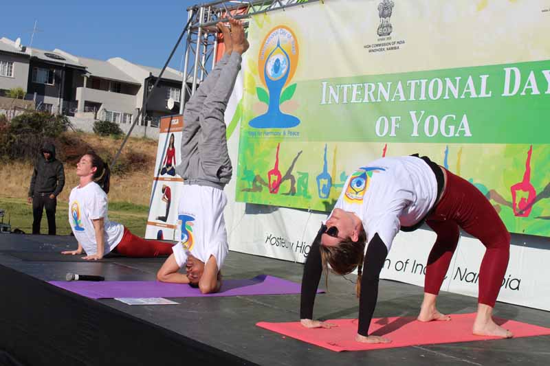 Yoga Teachers performing advanced Yoga postures